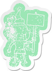 cartoon distressed sticker of a crying woman with protest sign wearing santa hat