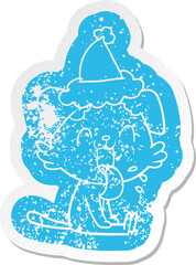cartoon distressed sticker of a panting dog wearing santa hat