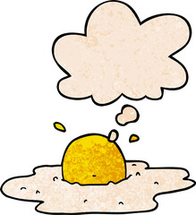 cartoon fried egg and thought bubble in grunge texture pattern style