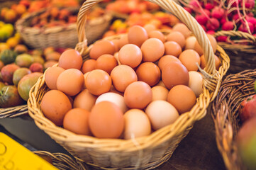 Eggs in rustic basket (local market)