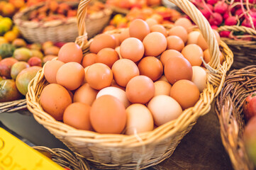 Eggs in rustic basket (local market)
