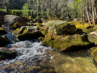 Naklejka na ściany i meble Water stream near Fecha de Barjas waterfall