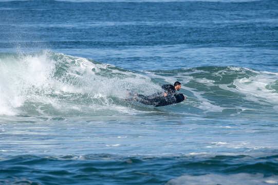 Bodyboarder surfing ocean wave