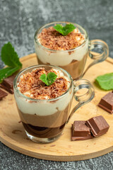 Delicious homemade mousse Three chocolate in jars, Restaurant menu, dieting, cookbook recipe top view