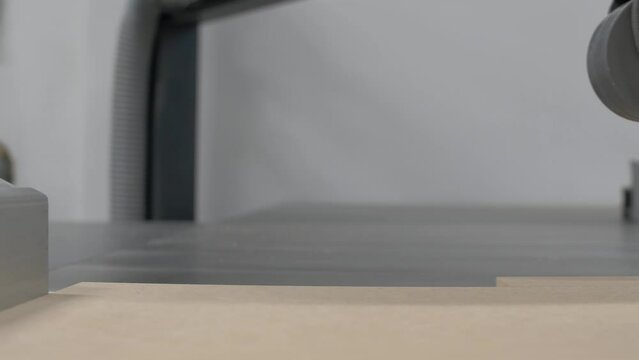 Table saw cutting wood mdf movement shot close-up