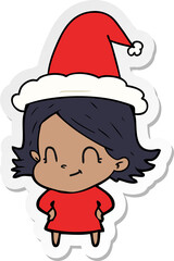 sticker cartoon of a friendly girl wearing santa hat