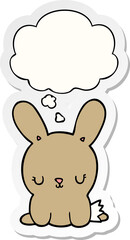 cute cartoon rabbit and thought bubble as a printed sticker