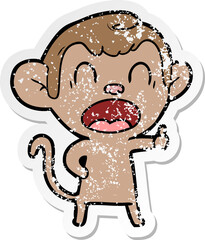 distressed sticker of a yawning cartoon monkey