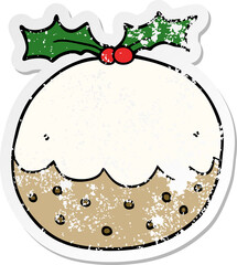 distressed sticker of a cartoon christmas pudding