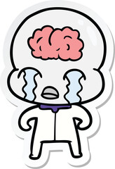sticker of a cartoon big brain alien crying