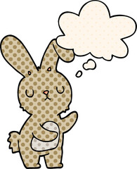 cute cartoon rabbit and thought bubble in comic book style