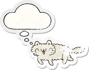 cartoon cat and thought bubble as a distressed worn sticker