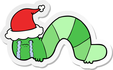 sticker cartoon of a caterpillar obsessing over his regrets wearing santa hat