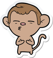 sticker of a cartoon suspicious monkey