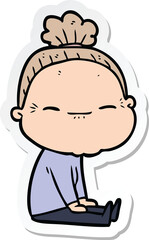 sticker of a cartoon peaceful old woman