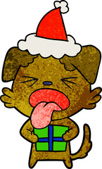 textured cartoon of a dog with christmas present wearing santa hat