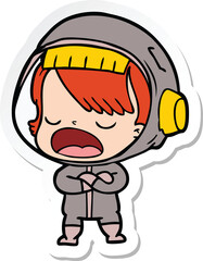 sticker of a cartoon talking astronaut