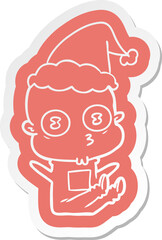 cartoon  sticker of a weird bald spaceman wearing santa hat