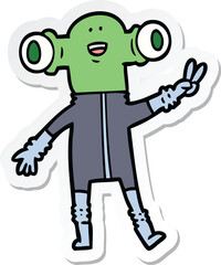 sticker of a friendly cartoon alien giving peace sign