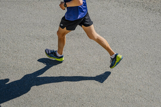 Kazan, Russia - May 17, 2022: llegs male runner running race during Kazan Marathon