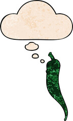 cartoon chili pepper and thought bubble in grunge texture pattern style