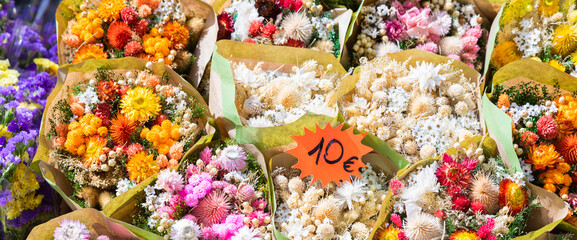 Vintage flowers market on public street - retro cottagecore style.