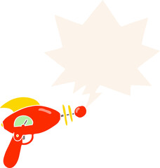 cartoon ray gun and speech bubble in retro style