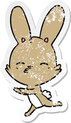 distressed sticker of a curious bunny cartoon