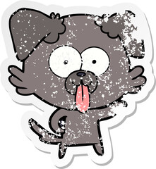 distressed sticker of a cartoon dog with tongue sticking out