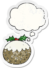 cartoon christmas pudding and thought bubble as a distressed worn sticker