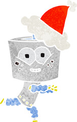 happy retro cartoon of a robot wearing santa hat