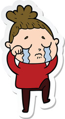 sticker of a cartoon crying woman