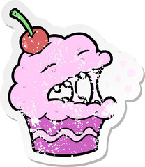 distressed sticker of a cartoon cupcake