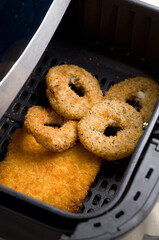 Close-up of Crispy Cooked Calamari and Fish in Air Fryer
