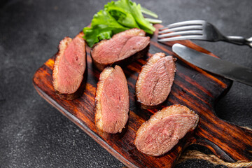 duck breast roasted second course fresh poultry meat meal food snack on the table copy space food background rustic top view