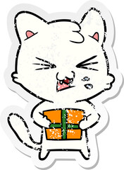 distressed sticker of a cartoon hissing cat