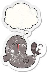 cute cartoon whale and thought bubble as a distressed worn sticker