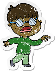 distressed sticker of a cartoon boy wearing spectacles