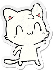 distressed sticker of a cartoon happy cat