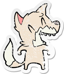 distressed sticker of a laughing fox cartoon