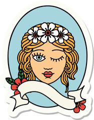 tattoo sticker with banner of a maiden with crown of flowers winking