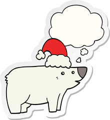 cartoon bear wearing christmas hat and thought bubble as a printed sticker