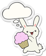 cute cartoon rabbit with muffin and thought bubble as a printed sticker