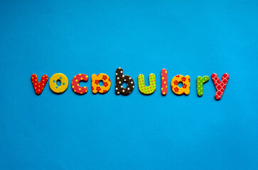 colored vocabulary on blue paper background