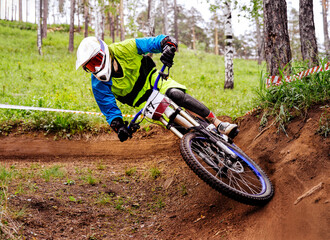 downhill athlete biker ride turn of earth trail