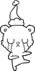 crying polar bear line drawing of a wearing santa hat