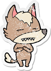 distressed sticker of a cartoon wolf showing teeth