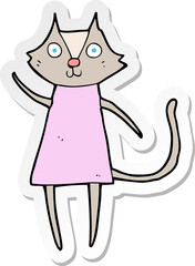 sticker of a cute cartoon cat waving