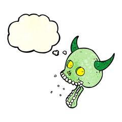 cartoon spooky skull with thought bubble