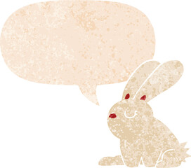 cartoon rabbit and speech bubble in retro textured style